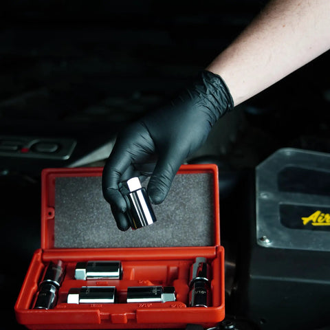 8 Piece Stud Extractor Set For SAE And Metric, Broken Stud Removal Sockets with red case in automotive repair setting