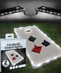 White LED Cornhole Lights For Hole And Board Complete 2 Board Kit with lit boards and packaging on grass background