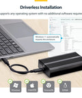 Top Notch USB4 And Thunderbolt 3 M.2 Nvme Ssd Enclosure Featuring Chill Aluminum Heatsink Casing For Hassle Free Portable Drives connected to a laptop.