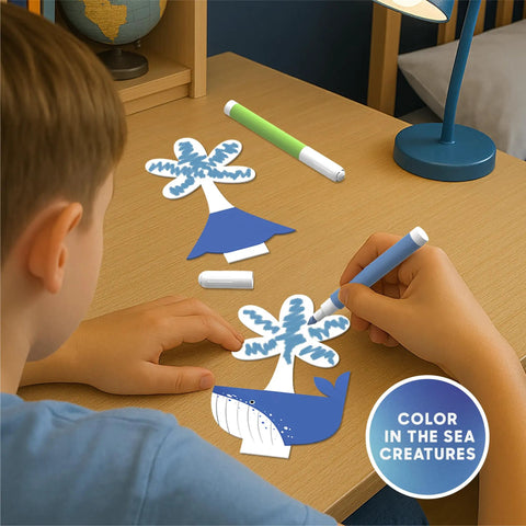 Child using Deep Sea Crystal Grow Kit for Kids - 32-Piece STEM Chemistry Lab to color sea creatures on a desk
