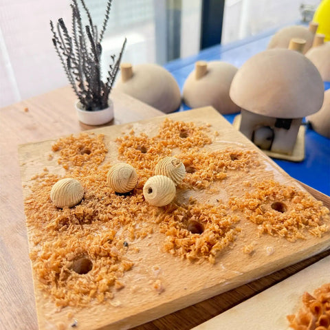 EssEthmy 60W Mini Metal Wood Lathe, Precision Bead Turner with crafted wooden beads and shavings on a work surface.