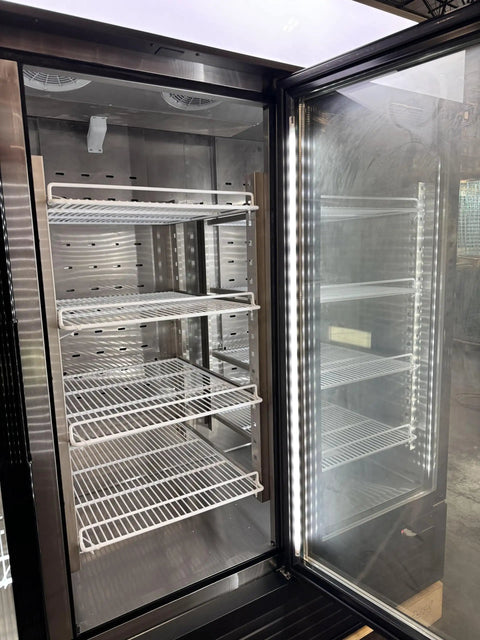 Interior view of Heavy Hitter Commercial Merchandiser Freezer With Three Self Closing Glass Doors and bulletproof adjustable shelving.