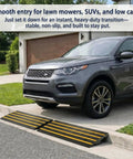 Heavy Duty Rubber Curb Ramps 2 Pack For Driveway Transition And Low Clearance Rides Built To Glide Over Sidewalk Edges Without Scraping Your Front Lip On Casual Cruises with an SUV on a driveway.