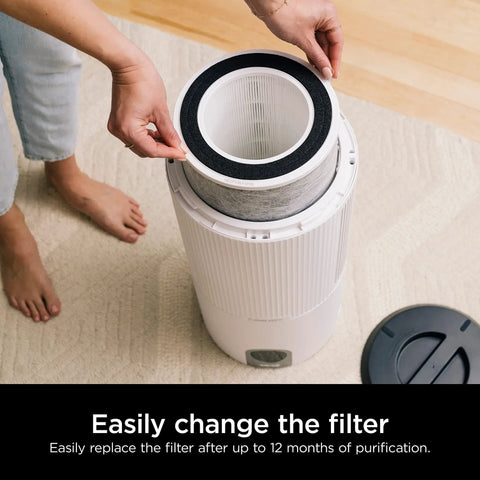 Person installing Replacement Filter For HP200 Series Air Purifiers With True HEPA Anti Allergen Filtration Odor Guard And VOC Protection
