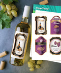 Printable vinyl sticker sheet with four ornate wine-label designs; wine bottle and grapes beside PaperVisual packaging.