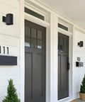 5 Inch Black Modern Outdoor Wall Lantern Light for Patio and Exterior, sleek minimalist look on white house exterior
