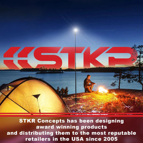 Tri Mobile 2000 Lumen Area Work Light illuminating campsite next to tent with STKR Concepts logo and campfire.