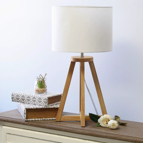 Interlocked Triangular Natural Wood Table Lamp With White Fabric Shade On Cord Easy Switch Sleek Modern Desk Light For Reading And Living Spaces Natural Wood Base Uses 40W Equivalent Bulb Not Included on a desk