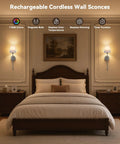 Battery Operated Wall Sconce Set of 2, RF Remote, Grey and Grey Shade mounted beside a bed in a cozy bedroom setting.