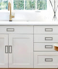 Kitchen cabinets with Two Piece Aluminium Alloy Flip Handle Hidden Door Pull Handles Set, silver, 64mm hole distance, installed view.