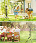 Standing Outdoor Misting System With Adjustable Tripod From Two Point Six Feet To Five Point Three Feet Portable Patio Water Mister in use