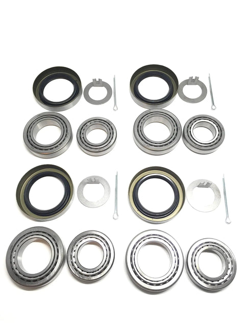 Set Of 4 Trailer Bearing Kits For 3500 Lb Tandem Axle With Inner And Outer Bearings Races And Double Lip Grease Seals 1.719 Inch I D For 84 Spindle Includes L68149 L68111 L44649 L44610, laid out with components visible