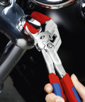 Adjustable Pliers Wrench Chrome Finish With Quick Release Button gripping bolt on motorcycle