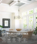 18 Inch Three Light Drum Chandelier Pendant Light With Adjustable Height In Brushed Nickel Finish, hanging in dining room