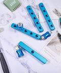4 Pack Aluminum Pneumatic Manifold Block With 2 Inlets And 5 Outlets, G1/2 and G1/4 Ports, displayed with tools and accessories
