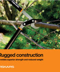 32 Inch PowerGear Bypass Lopper with patented mechanism cutting a tree branch in a garden setting