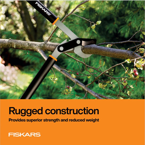 32 Inch PowerGear Bypass Lopper with patented mechanism cutting a tree branch in a garden setting