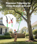 Gardener using Extendable Manual Pole Saw With Eight Section Reach Up To 27 Feet, trimming high branches.