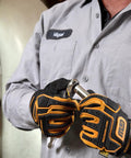 Mechanic using Three Eighths Inch Drive 90-Tooth Quick Release Teardrop Ratchet With 4-Degree Swing Arc in confined space
