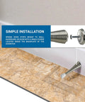 2 Pack Flexible Spring Door Stop Heavy Duty 3 Inch Brushed Nickel Finish Wall Protector installed on baseboard.