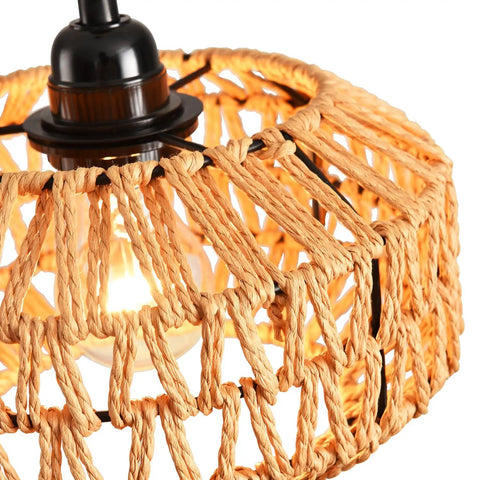 Close-up of Two Pack Mini Rattan Plug In Pendant Lights Hand Woven Boho Ceiling Fixture With Switch showing woven detail and light bulb.