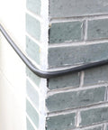 Heavy Hitter Air Compressor Hose Three Eighth By Fifty Feet Hybrid Line with snappy quick couplers along a corner.