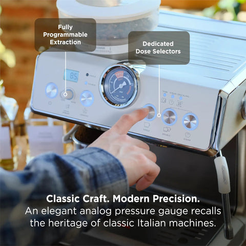 Person adjusting controls on Talos Semi Automatic Grind And Brew Espresso Machine with real-time pressure gauge visible