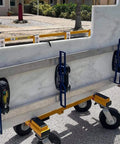 Grab On Pro Electric Suction Cup Lifter Portable Heavy Duty Tool For Wood Drywall Granite Glass Tile Automatic Pump Electronic Pressure Gauge Display Handy Lift Aid For Pros And Dudes Easy Popping attached to a heavy marble slab on a wheeled cart.