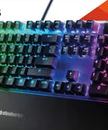 Top Tier Mechanical Gaming Keyboard Featuring Integrated OLED Display USB Passthrough Media Controls Heavy Duty Aluminum Housing Tactile Clicky Blue Switches Full Spectrum RGB Lighting For Gamers with vibrant RGB backlighting and sturdy aluminum design.