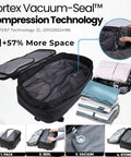Black vacuum-seal compression bag with cordless pump; open bag interior and folded clothes nearby.