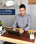 Man working at desk with XL Desk Pad 17 X 36 Inch Large Vegan Leather Desk Mat For Home Office And Computer Setup, waterproof non-slip mat.