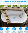 M METERXITY 2-Pack 5.9 in Silicone Tub Stopper, Bathtub Drain Stopper in a white bathtub on a wooden deck.