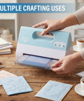 Electric Automatic A4 Die Cutting And Embossing Machine With Complete Accessory Kit in use for crafting on wooden table.