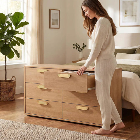 Woman opening drawer with Top Shelf Gold Drawer Pulls 2 Pack 5.5 Inch Cabinet Handles in retro style on wooden dresser.