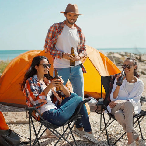 People enjoying Two Pack Ultra Lightweight Camping Chairs For Adults And Teens, 250 Lb Capacity, Foldable Portable Chairs at beach