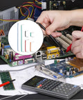 Hands using 840 Piece Breadboard Jumper Wire Kit With 14 Sizes From 2mm To 125mm Solderless Flexible Cables on PCB