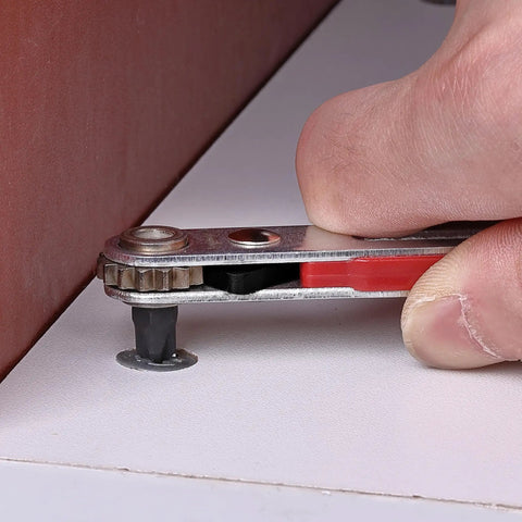 Person using Must Have Compact Magnetic One Quarter Inch Mini Ratchet Wrench With 90 Degree Right Angle Screwdriver to tighten a screw
