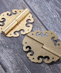 Sick Antique Brass Flower Hinge Pair Decorative Cloud Hinge For Cabinet Drawer And Jewelry Box Includes Heavy Duty Screws For A Top Shelf Furniture Hardware Upgrade 60 By 55 Mm, showcasing two vintage-style brass hinges.