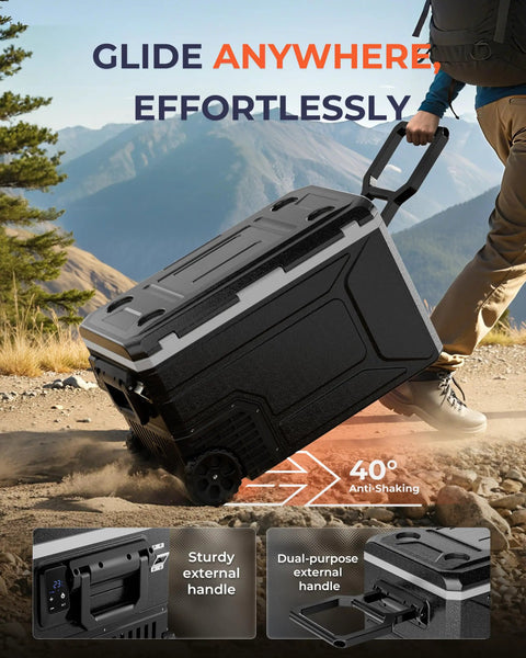 Massive 69 Quart 12V Portable Refrigerator And Freezer Cart Riding On Tough Off Road Wheels, showcasing sturdy handle and durability on rough terrain.