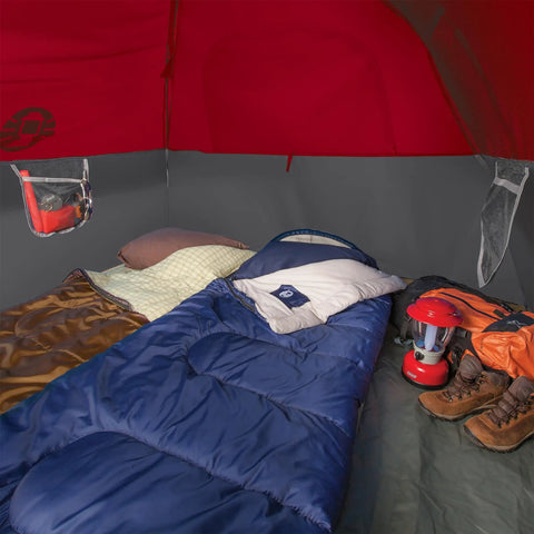 Brazos 20 To 30 Degree Fahrenheit Adult Cool Weather Sleeping Bag in blue inside a red tent with camping gear visible