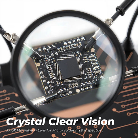 Zoomed view of PCB through 5X magnifier showing details of All-in-One Soldering Stand With Four Handy Helping Hands And 5X Magnifier.