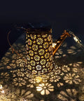 Cozy Watering Can Solar Powered Lights Outdoor Lantern with Fairy String Lights casting floral patterns
