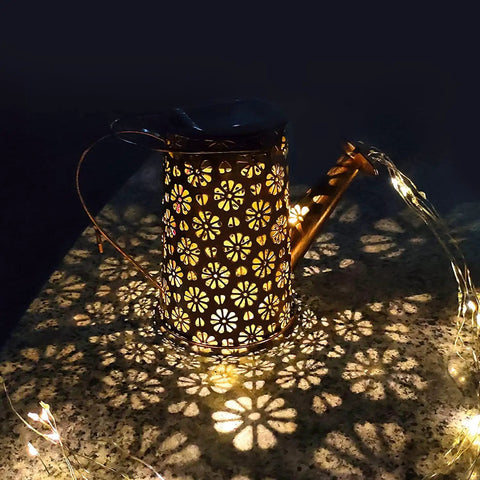 Cozy Watering Can Solar Powered Lights Outdoor Lantern with Fairy String Lights casting floral patterns