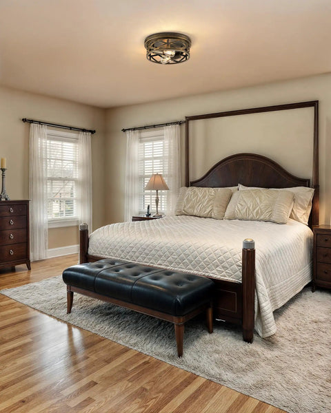 Industrial Three Bulb Ceiling Light With Vintage Metal Cage, Oil Rubbed Bronze Flush Mount Fixture in a cozy bedroom setting.