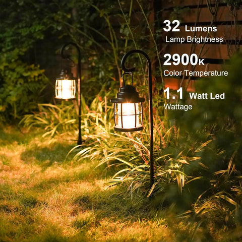 Awesome Four Pack Low Voltage Outdoor Hanging Path Lights Kit Warm White Led Metal Shepherd Hook Lights illuminating a garden path.