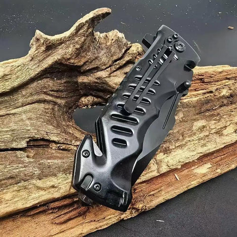 Black Serrated Folding Knife With Dual Edge Design For Outdoor Camping, Fishing And Hunting on wooden background