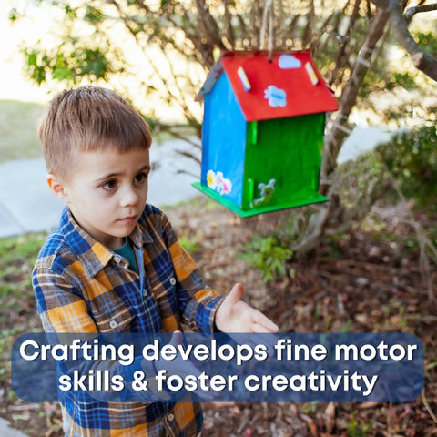 Bulk 12 Kid Friendly Bird House Craft Kits With Unfinished Wood Bird Houses, Paint Strips, Brushes, And Simple Instructions For A Hands On Build And Paint Project Great For Classrooms, Parties, And Family DIY Fun. Child beside painted wooden birdhouse craft kit outdoors