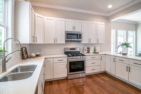 Modern kitchen with 25 Pack Brushed Satin Nickel 3 Inch Cabinet Pulls, 76mm Hole Centers, Dope Kitchen Cabinet Hardware on white cabinets.