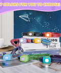 Assorted Rechargeable Kids LED Headlamp With Lit RGB Color Cycle Adjustable Headband on display