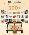 Front view ACMER laser engraver machine orange with black frame engraving a circular pattern on wood; home-use device.